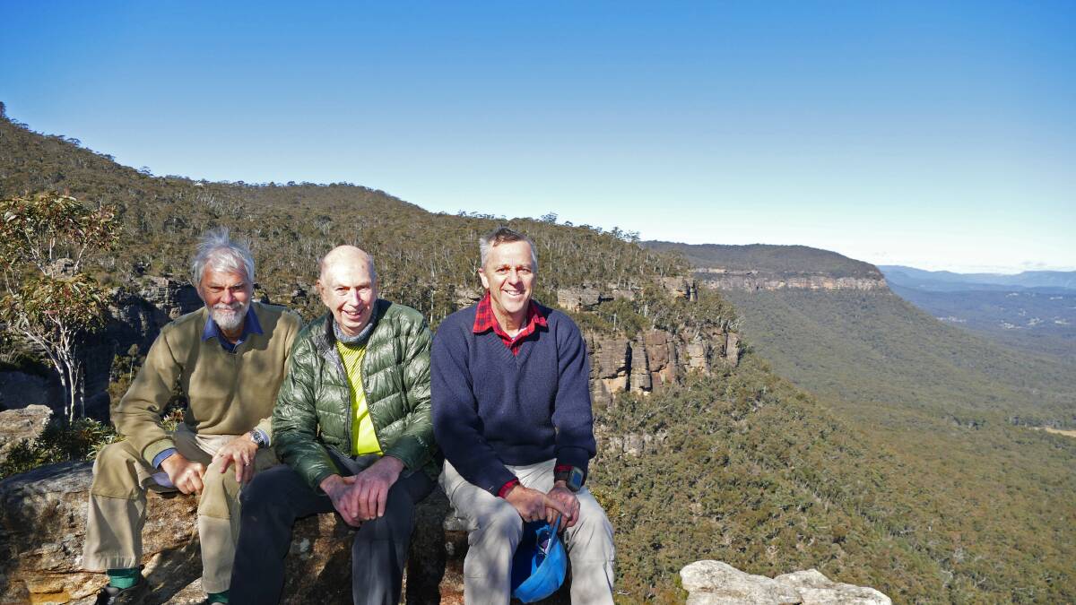 Outdoor authors: Co-authors for the Blue Mountains Geographical Encyclopaedia John Fox, Michael Keats and Brian Fox at Solomons Seat at Medlow Bath.