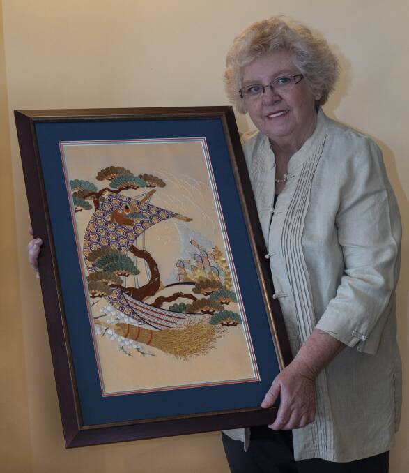 Treasure Ship: Dianne with one of her embroideries, a replica of one of the famous Konbuin Fukusa from the Edo period. 