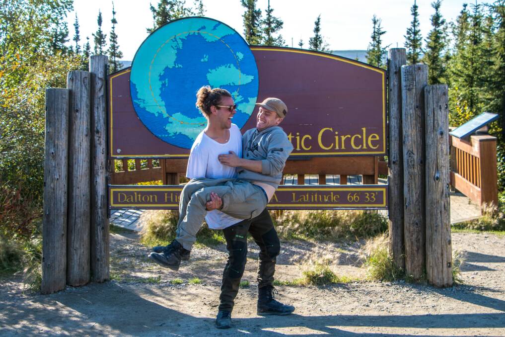 Joel Hayes and Keegan Taccori at the Arctic Circle, the official starting point of their long journey south.