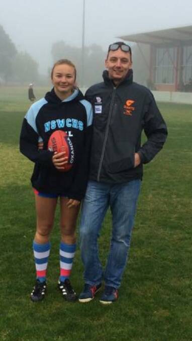 NSW selection: Casey and her brother, Michael Hollier, at the AFL carnival in Albury earlier this month.