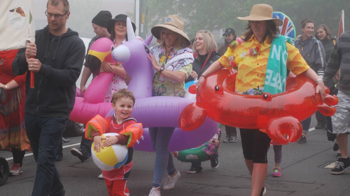 Grand parade: The mist didn't deter participants in last year's Rhodo Festival parade.