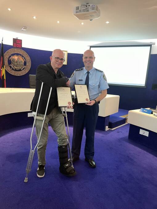 Acting Inspector Rob Capewell presents certificates of appreciation to the mayor, Cr Mark Greenhill. Picture Jennie Curtin 