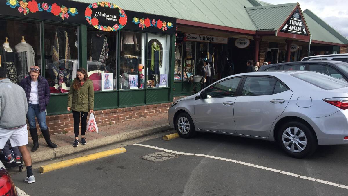 The small rectangular barriers designed to stop cars mounting the footpath are proving a hazard to pedestrians.