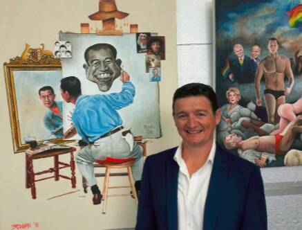 James Brennan with his painting of Anh Do, which took out this year's Bald Archy prize.