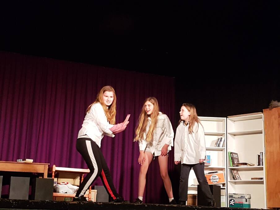 Gleeful: Hannah Strong, Daisy Levell and Annalucia Fergus in rehearsals for Glumbooks - The Musical, playing at Blackheath Community Hall this Friday to Sunday.
