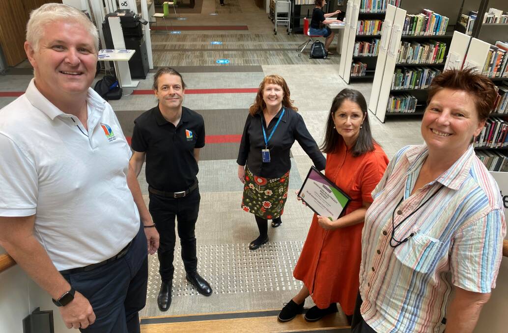 Recognition: Shane Clancy and Damien Farrington from award sponsor Library AV & Large Print with and community, library and customer services manager, Vicki Edmund, reference and marketing librarian, Theresa Lock, and library assistant, Susan Ambler.