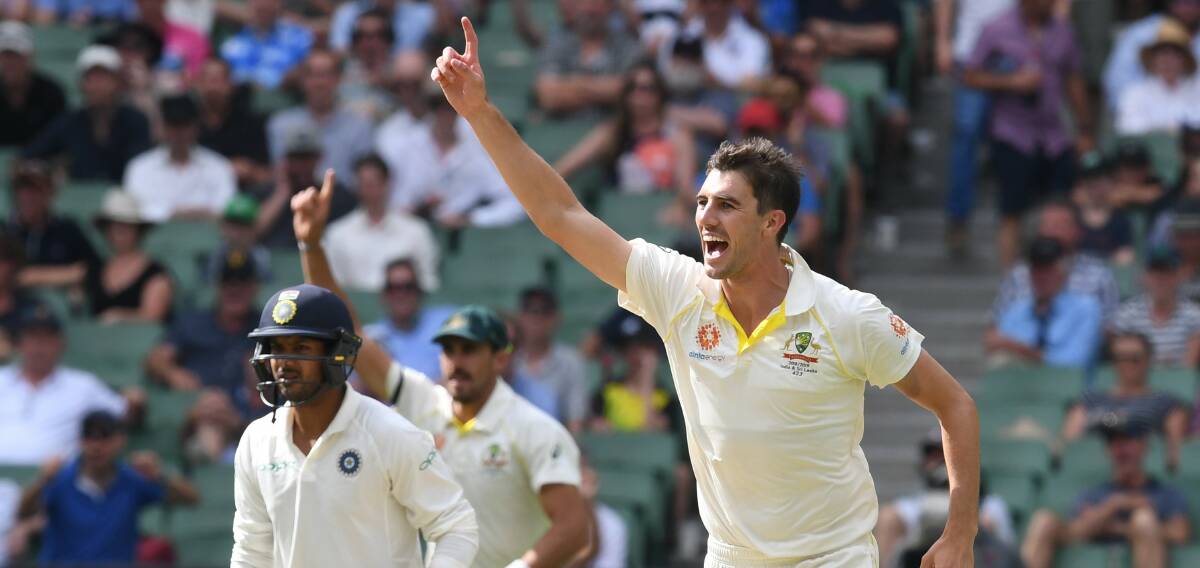 Top player: Pat Cummins celebrates dismissing Virat Kohli, one of the nine wickets he took in the Boxing Day Test in Melbourne.