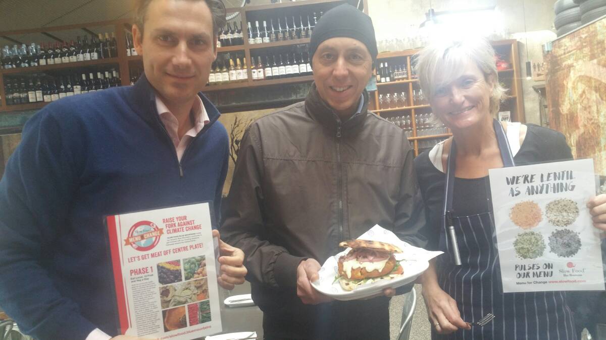 Slow Food Blue Mountains member  James Howarth of Leura Garage Restaurant,  with staff members Luca Postiglione and  Cathy Brown at the launch of their brand new lentil and chick pea burger.