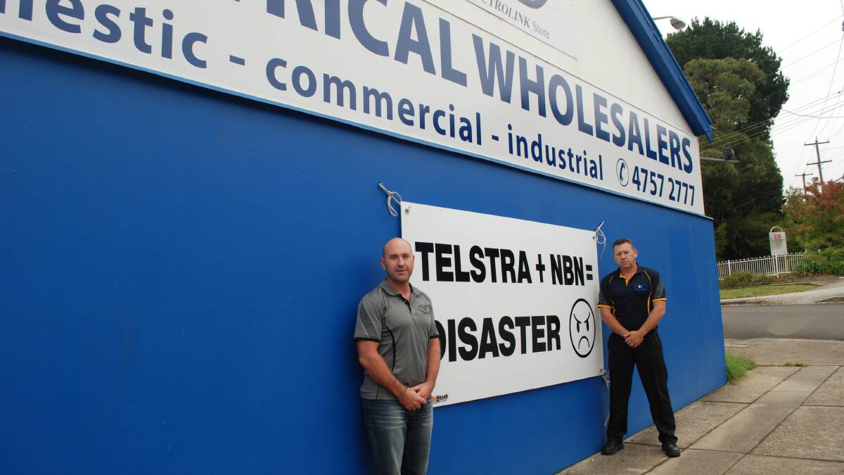 Last resort: Rod and Jason Rodziewicz from Alliance Electrical at Wentworth Falls have had nothing but trouble since the National Broadband Network was installed.