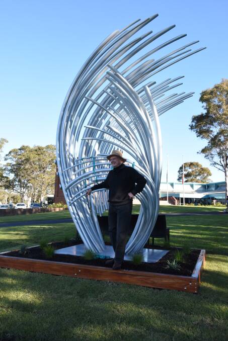 Sculptor Terrance Plowright standing in Duraya Dhuduga Barra Barra (River Touching Sea): In front of the Eurobodalla Council Chambers.