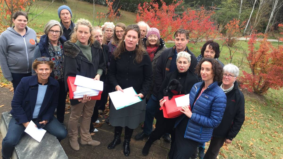 Katoomba Airfield opponents presented the 12,000-strong petition to Trish Doyle in May. It will be debated in state parliament on August 1.