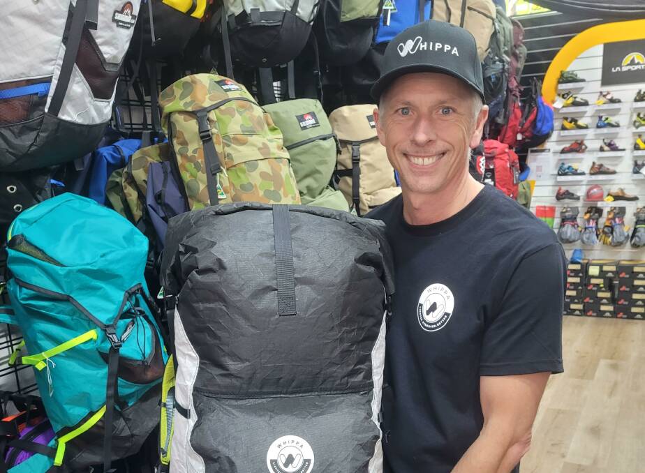 Robert Inshaw in the Summit Gear shop in Katoomba with a Whippa pack. 
