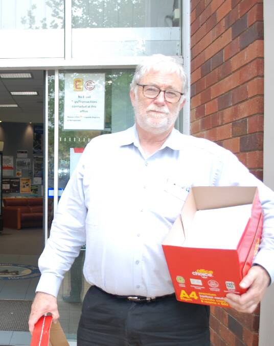 Direct delivery: Mark Alchin, owner of the Wayzgoose Cafe in Leura, delivered nearly 100 submissions and a petition to council chambers in Katoomba.