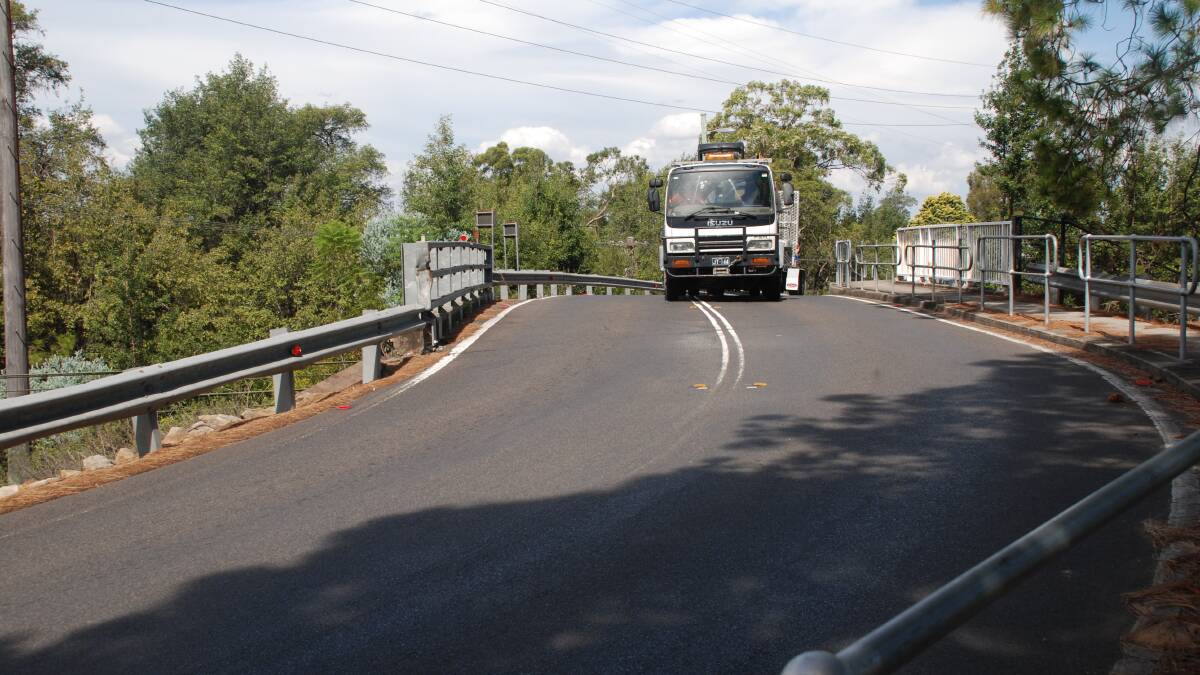 Wilson Way, Blaxland: Bridge barriers not adequate to stop a car crashing through and on to the rail lines below.