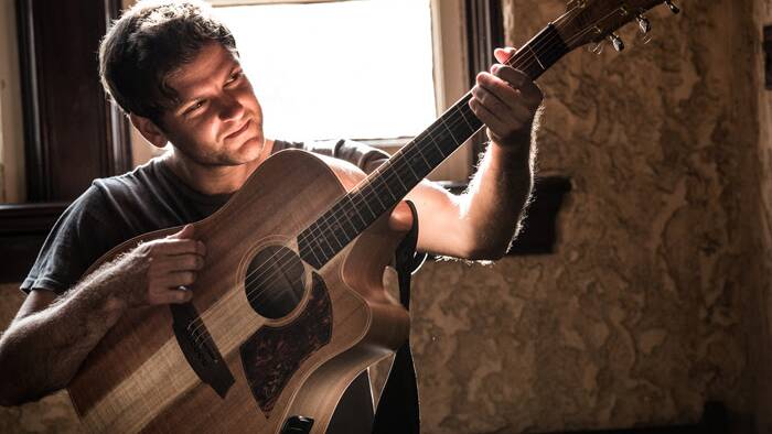 Daniel Champagne: Bringing his virtuoso guitar back to the Mountains.