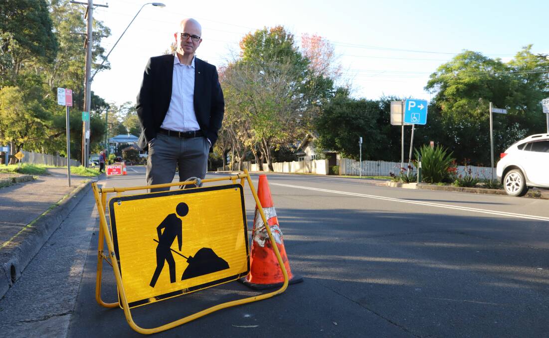 The mayor, Cr Mark Greenhill, near some roadworks being carried out by council.
