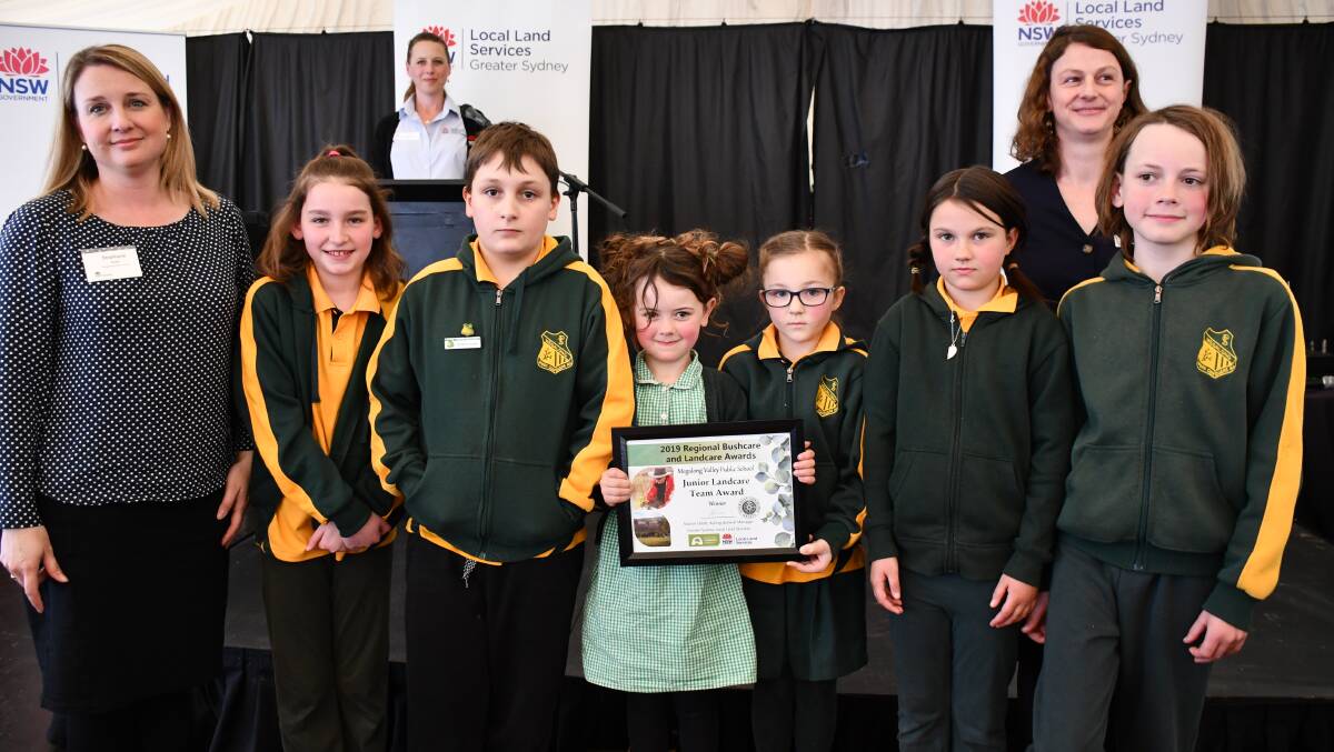 Megalong Students with their principal, Stephanie Scott, and the Landcare junior team award.