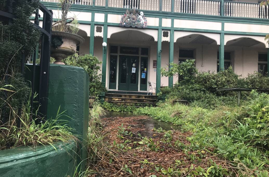 Untouched: The overgrown path to the front door of the Imperial Hotel.