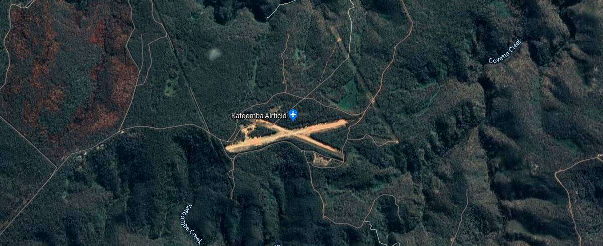 Satellite photo of Katoomba Airfield, surrounded by National Park, taken from Google Maps.