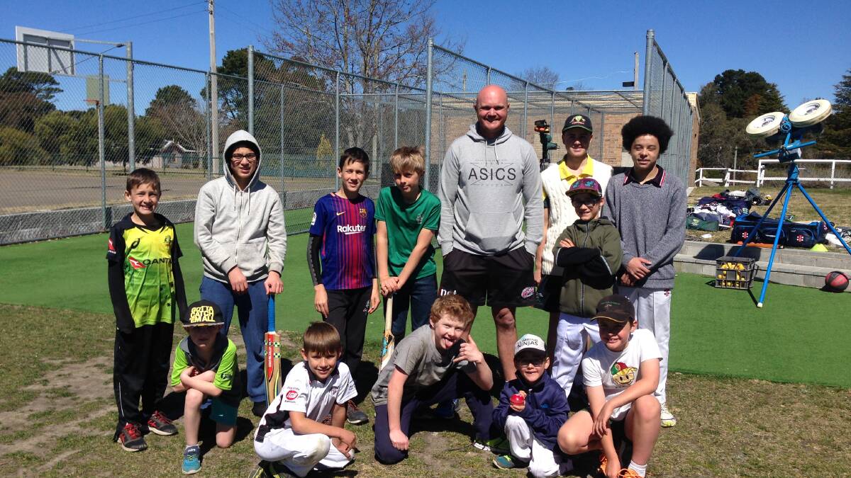 Doug Bollinger with some of the junior cricketers at Blackheath Oval on Sunday, September 16.
