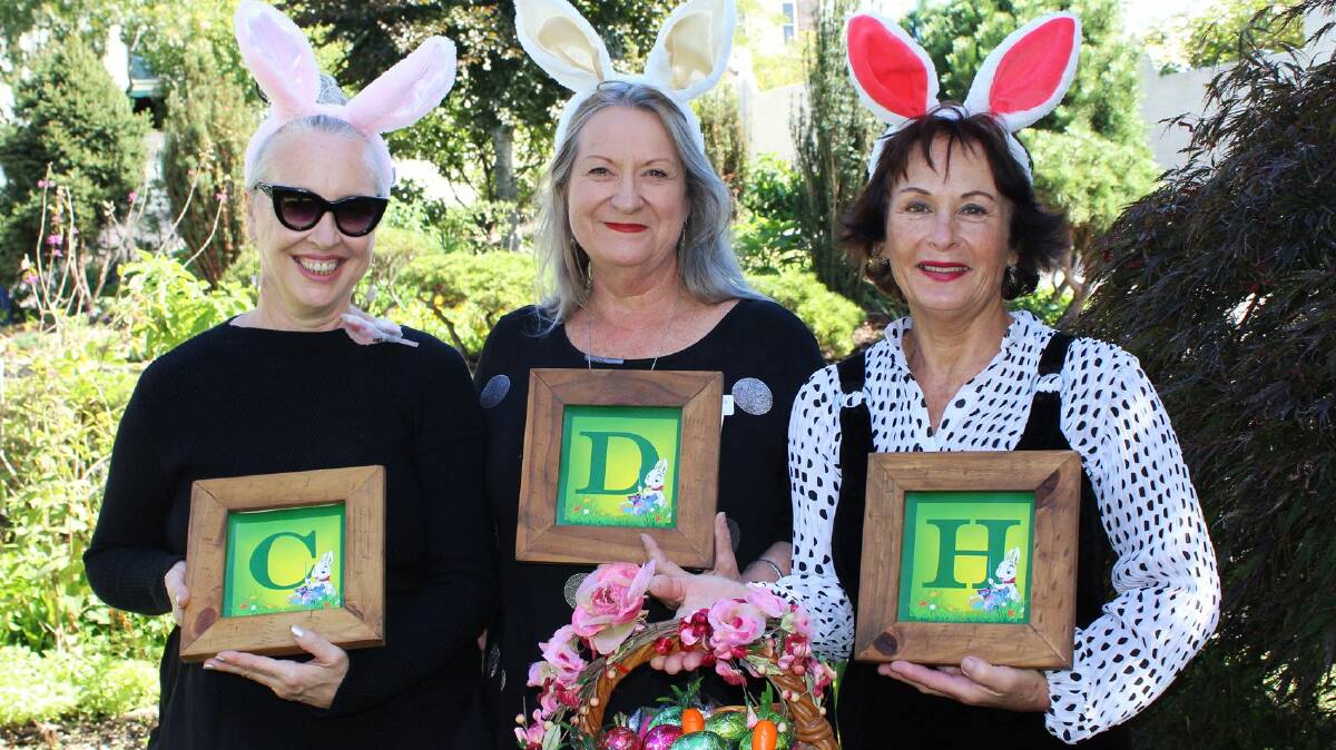 Katoomba competition: Lynne Curan (Omnia), Debbie Cash (Beaut-T-Ful Bags) and Louise Florence (Heart of Stone) with some of the clues in the great Easter Egg Hunt.