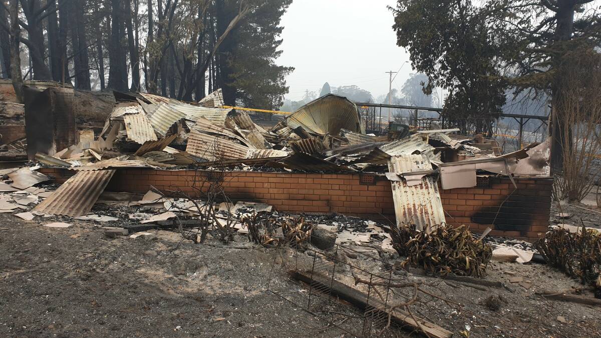 Gone: A house destroyed at Bell during December's fires in the Mountains.