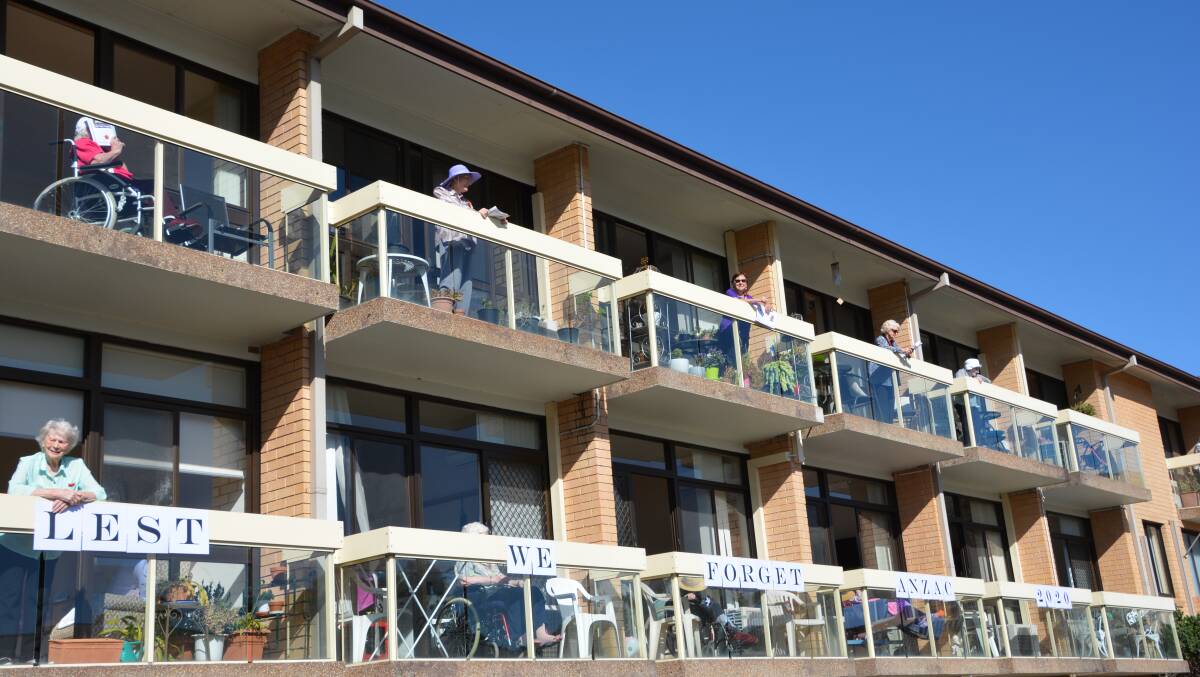 Residents at Uniting Springwood Aged Care watched the centre's Anzac Day ceremony from their balconies last year. 