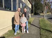 Unique village: Michael Sheargold, Shane McLucas and daughter Frankie Hilsz outside their newly acquired property, the Victoria and Albert Guesthouse in Mt Victoria.