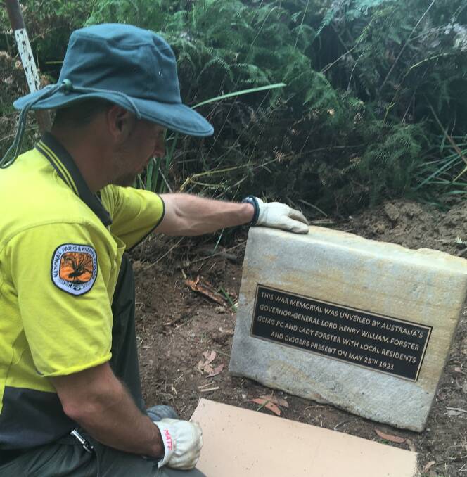 National Parks worker Mathew Dickens, who helped install the plaque with his colleague, Rebecca Chatfield.