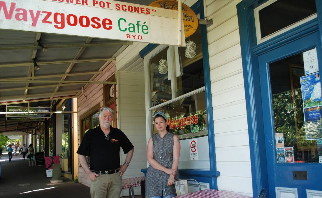 Could it be for sale?: The Wayzgoose Cafe's Mark Alchin and his daughter Rebecca outside the white ant infested weatherboard building where he has run a cafe for 15 years.