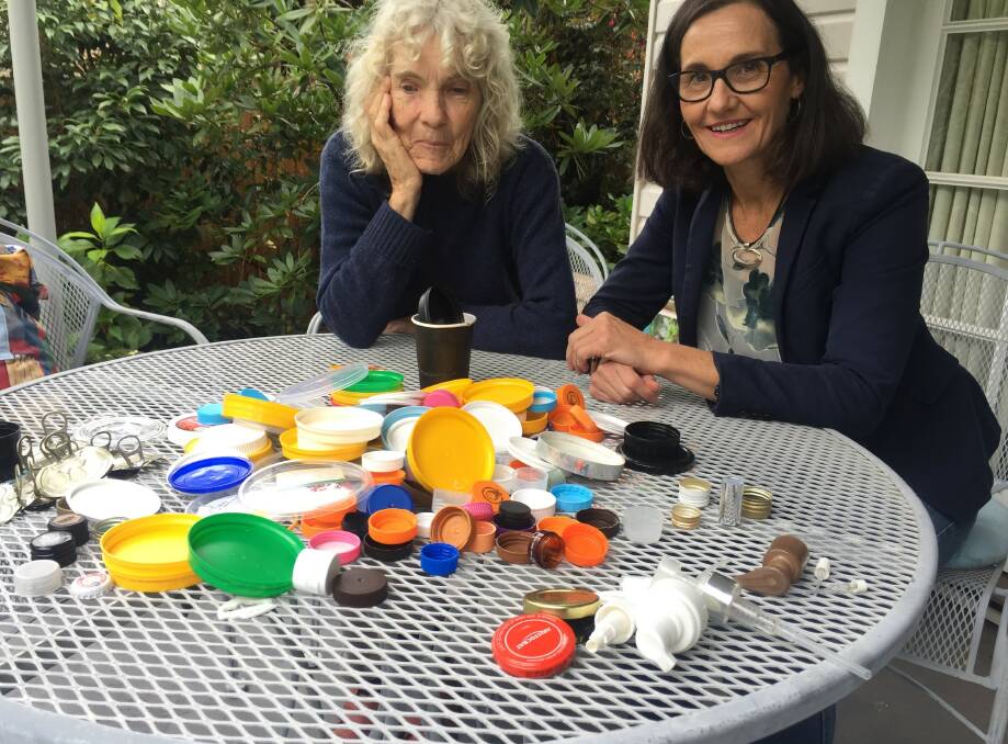 File photo: Shirley Lewis (aka the Bag Lady) and Cr Romola Hollywood with a sample of lids that can be recycled. To Katoomba's Shirley Lewis ASAP does not mean as soon as possible. In fact quite the opposite - it's about living as sustainably as possible.