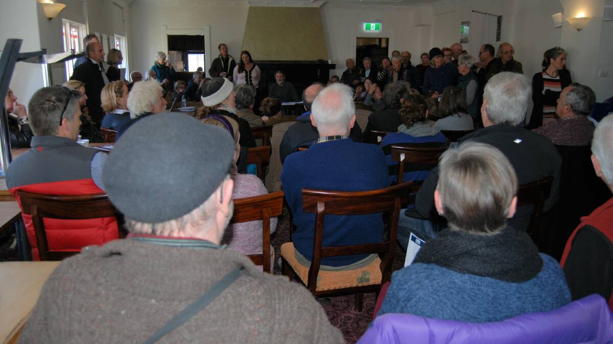 Some of the crowd at the lunchtime airfield meeting at Hotel Blue.