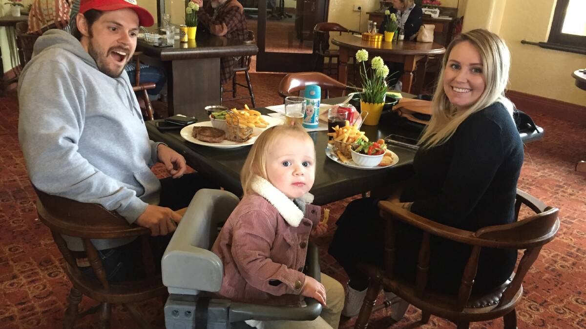 Escape: Kyle and Melanie Lane with 18-month-old Matilda were happy to get out of the house and have lunch at the New Ivanhoe Hotel in Blackheath.