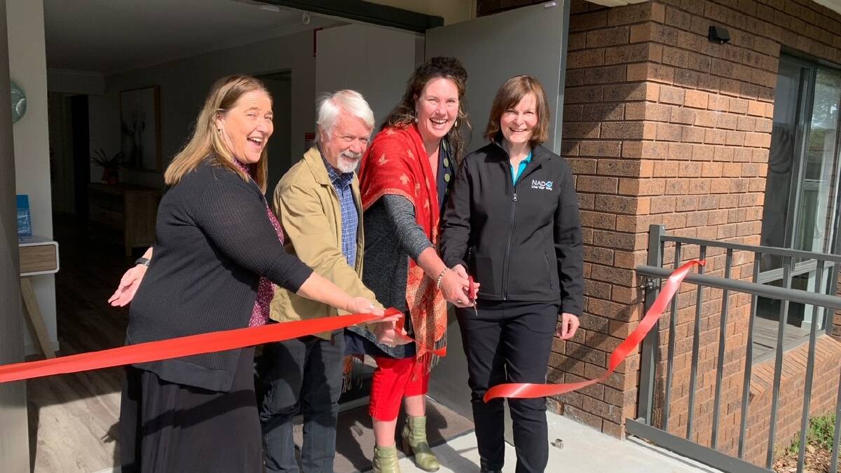 Cutting it: Kim Cowper (from Susan Templemans office), Cr Mick Fell, Trish Doyle MP and Denise Heath (NADO CEO) open the new short-term accommodation house. 