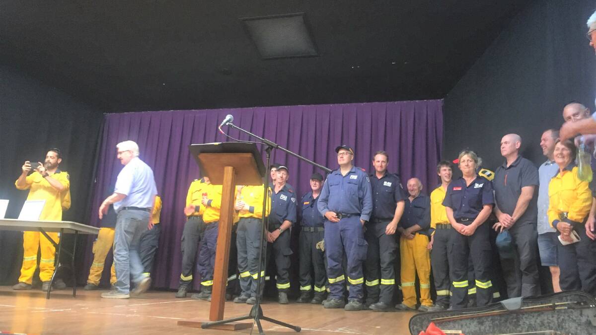 Some of the RFS, SES, Fire and Rescue and police who helped save the Upper Mountains in the December fires.