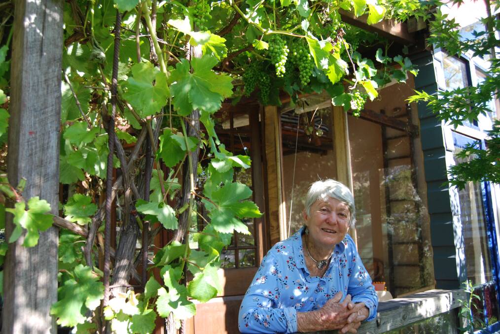 Rosemary "Rowe" Morrow OAM: Under the thriving grape vine in her Katoomba backyard.