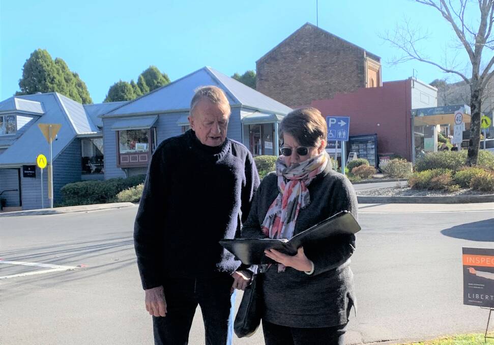 Leura Community Alliance: Members Neil Sing and Stephanie Moxham look at the traffic options on the corner of the Mall and Megalong Street.