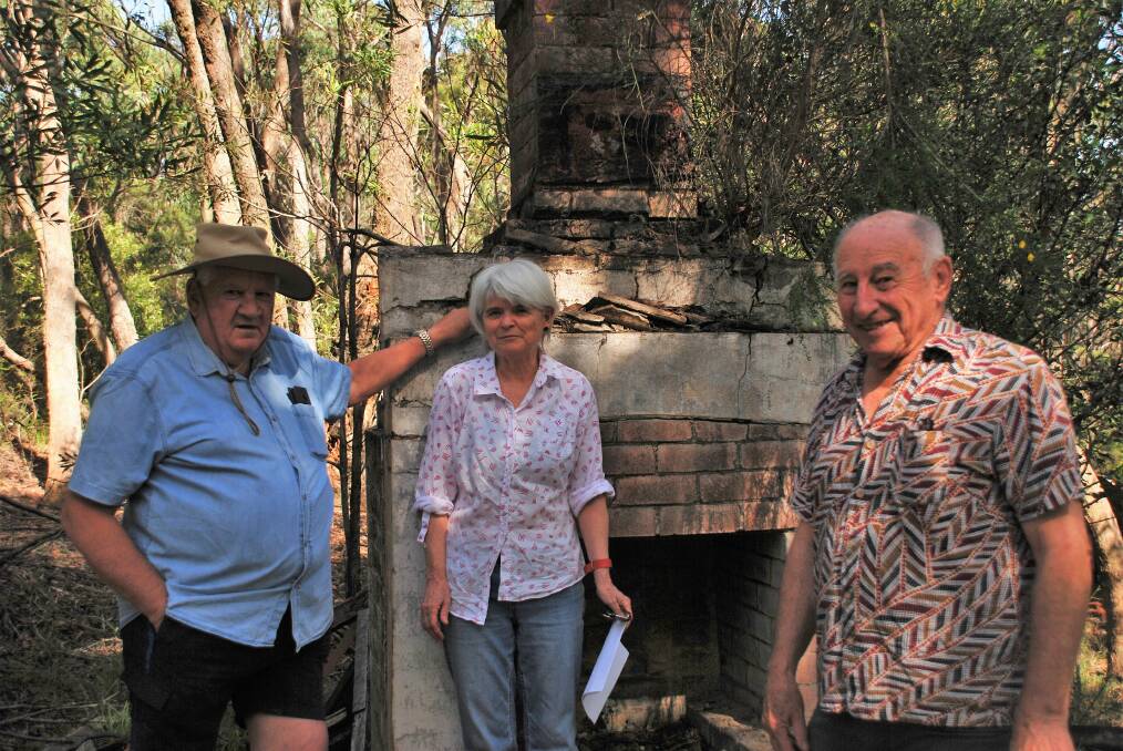 Former mayor, Jim Angel, Joanne Hornbrook and Cr Don McGregor in front of the fireplace of Eve Langley's old home in Leura.