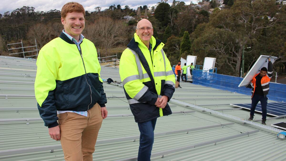Council's waste and sustainability program leader, Rob Morrison, and infrastructure project management officer, Phil Regan, at Katoomba Sports and Aquatic Centre when solar panels were installed in August 2020.