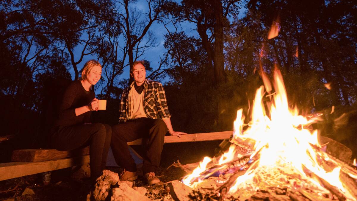 Settle in next to a campfire at Balor Hut campground in Warrumbungle National Park. Picture: Destination NSW
