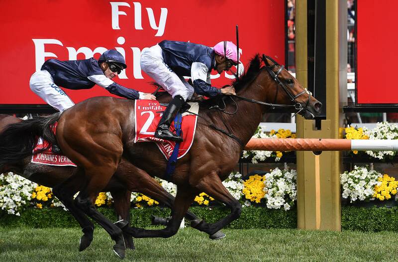 Rekindling, ridden by jockey Corey Brown, wins the 2017 Melbourne Cup. Photo: AAP Image/Tracey Nearmy