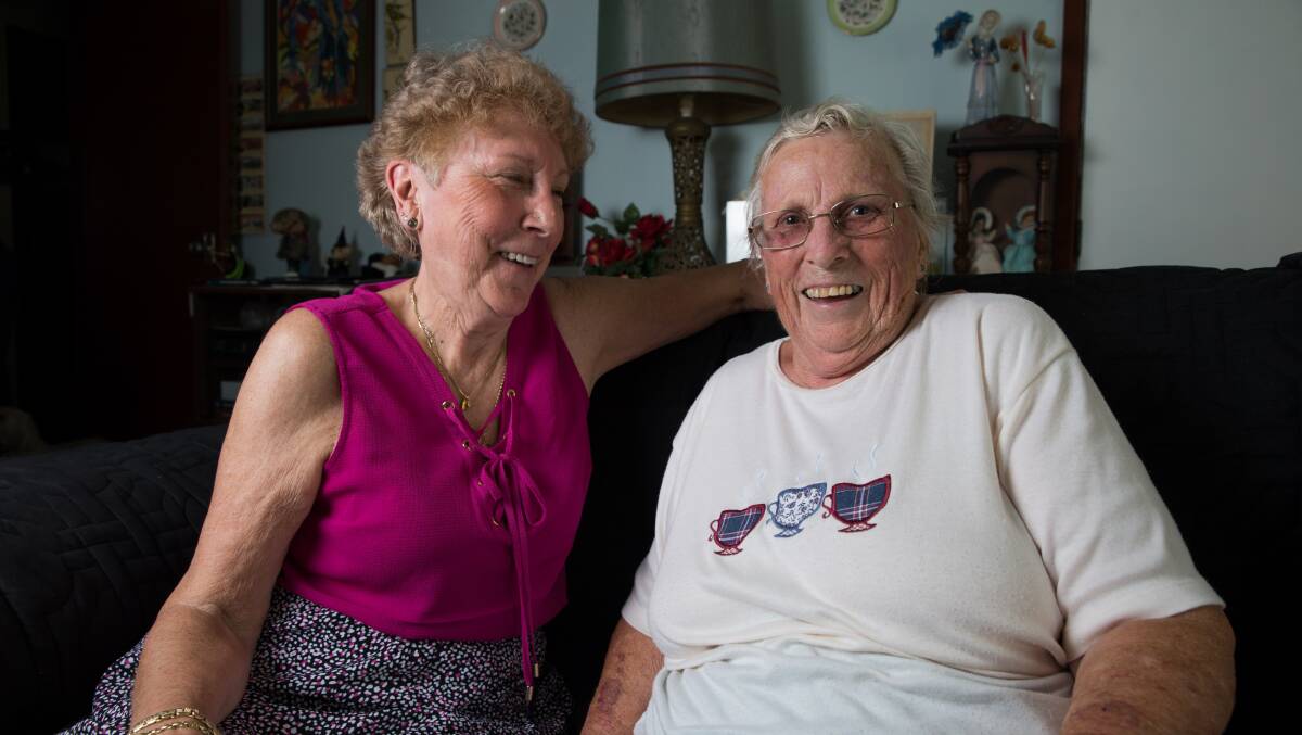 PEAS IN A POD: Sisters Anne Whitney (maroon top) and June 'Marie' Reid during Anne's recent visit to Marie's South Windsor home. Picture: Geoff Jones