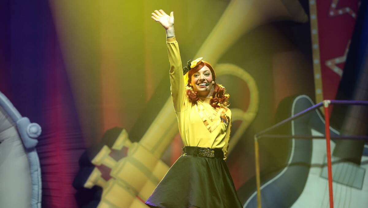 Emma Wiggle (Emma Watkins) greets fans at the start of the Ready Steady Wiggle concert at the AIS Arena in 2013. Photo: Canberra Times/Jeffrey Chan.