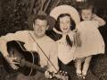 A very young Anne with parents Slim Dusty and Joy McKean during Slim's first tour in 1954. Picture supplied