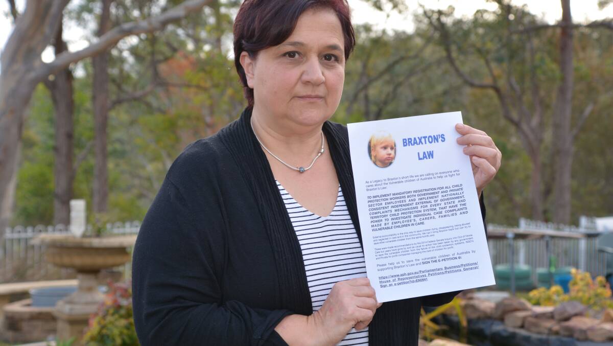 Better protection for vulnerable children: Maria Milardi with the Braxton's Law petition she will be urging people to sign in Springwood during the school holidays.