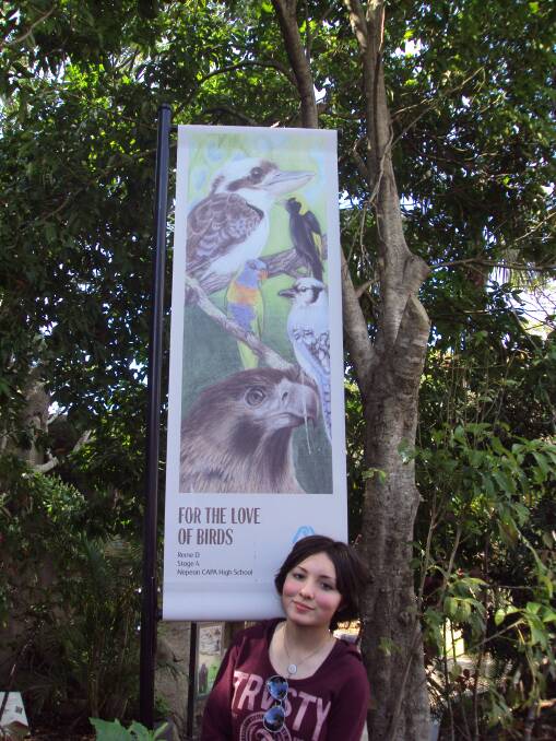 Reine de Villecourt with her competition-winning banner on display at Taronga Zoo.