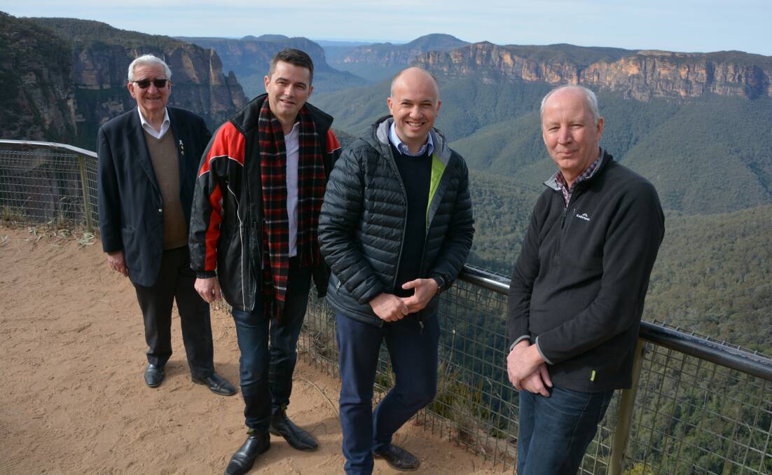 Councillor Kevin Schreiber, MLC Shayne Mallard, Environment Minister Matt Kean and the Blue Mountains director of NPWS David Crust, at Govetts Leap Lookout at Blackheath. The carpark at the iconic lookout will be improved, accessible paths added, and the toilets will include disabled access.