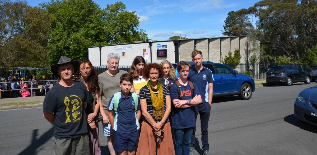 Pedestrian crossing call: Concerned parents Tony Bourke, Anna Feord, Russell Daylight  and Catriona Paterson with students on Martin Street by Katoomba High School.