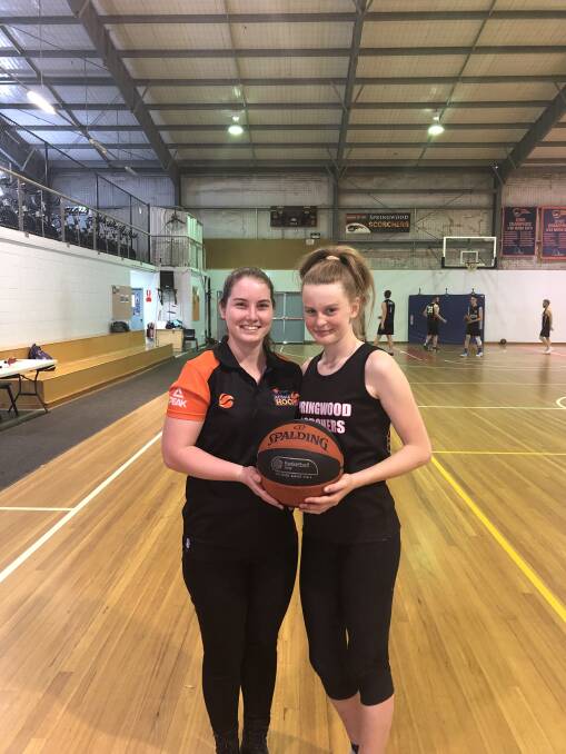 Jaimee Marsh, pictured with Grace Blackwood, who assists Jaimee with the Aussie Hoops program and also helps run the Pink Squad girls program.