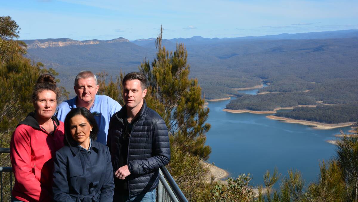 Pushing for alternative options: Trish Doyle, Ross Coster, Chris Minns and Prue Car overlook Lake Burragorang and protected areas they say would be inundated if the Warragamba Dam wall is raised.